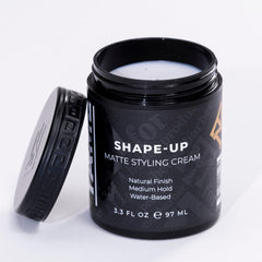 Mane Tame Shape-Up Matte Styling Cream close-up emphasizes clean formula.