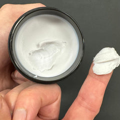 Mane Tame Shape-Up Matte Styling Cream on hair for versatile styling.