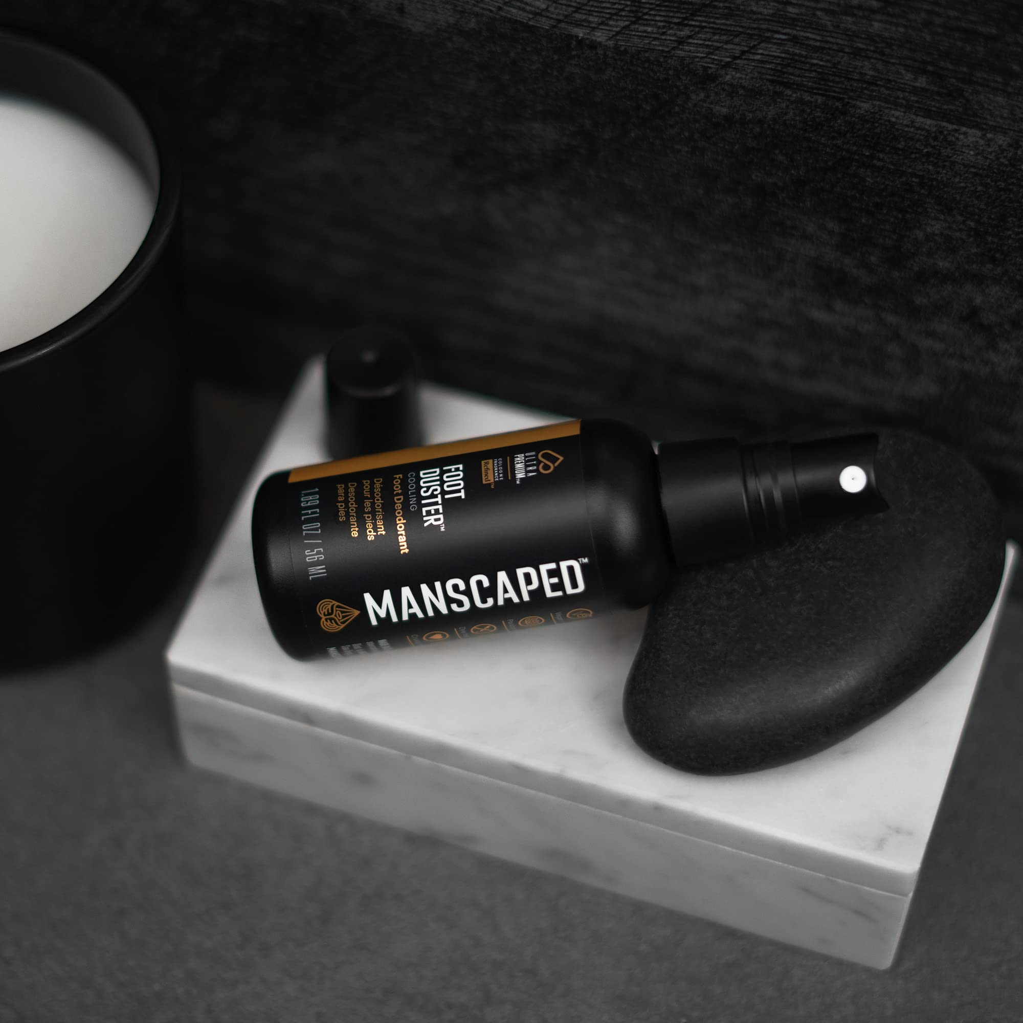 MANSCAPED Foot Duster coconut oil and peppermint illustration showing cooling sensation.