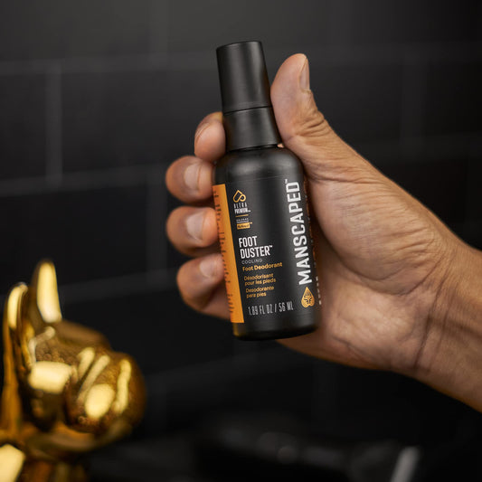 MANSCAPED Foot Duster spray applied on feet after workout for quick refresh.