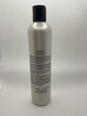 Applying Mantra Enlightenment Expand Volume Conditioner for voluminous, color safe hydration