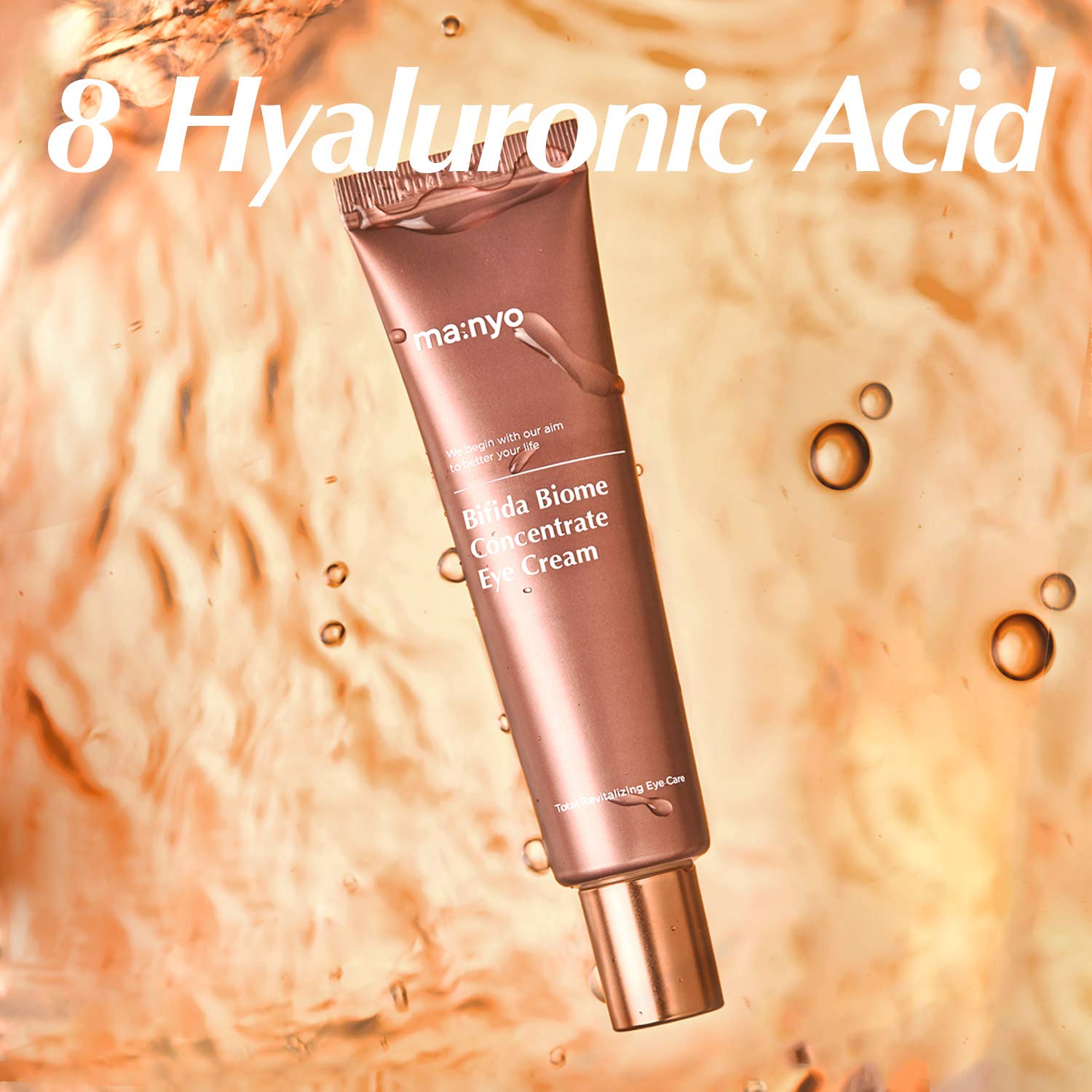 ma:nyo Bifida Biome Eye Cream moisture droplets on skin.