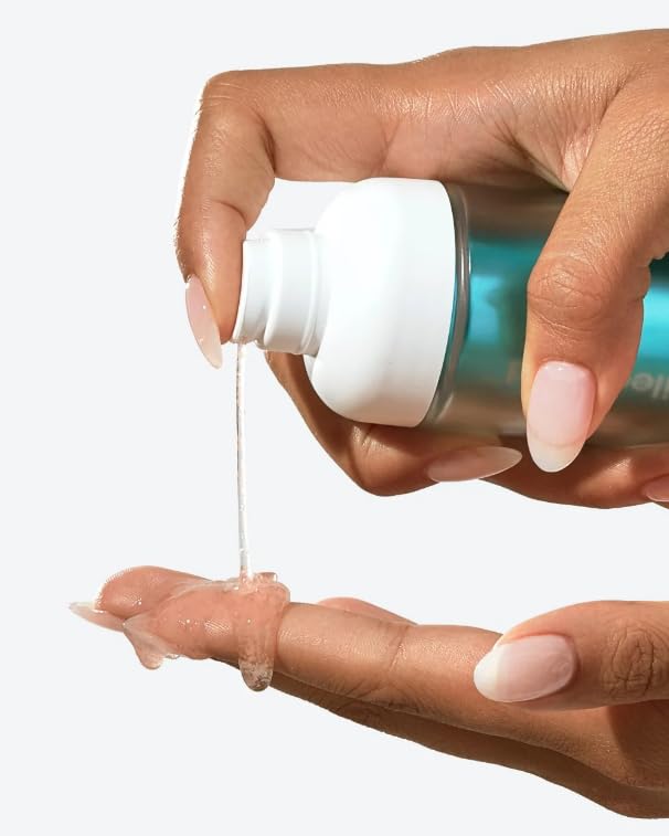 Applying MARC MATRIX Spoiledchild S33+ on cheek for a plump, hydrated look