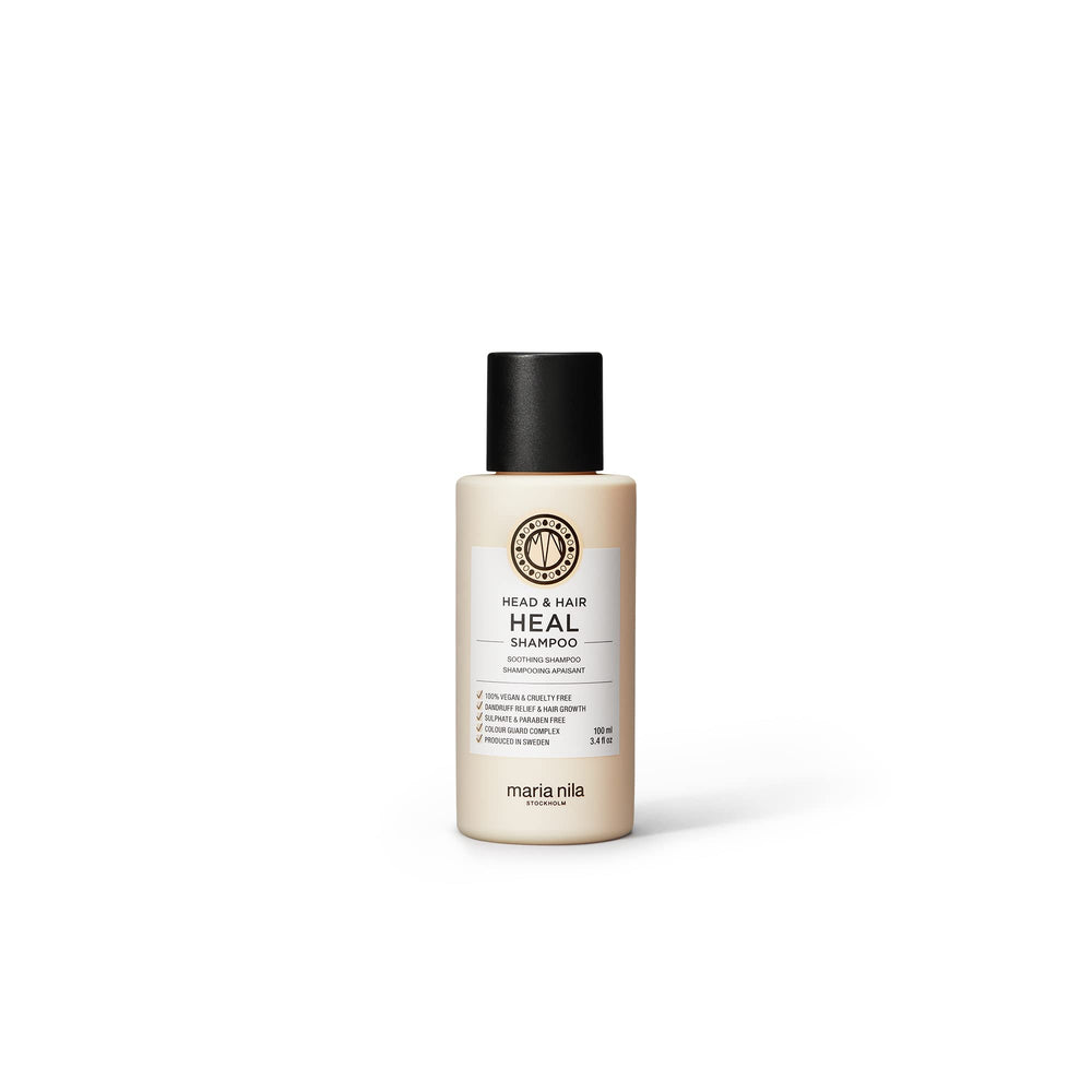 Maria Nila Head & Hair Heal shampoo bottle shown for gentle cleansing on dry scalps.