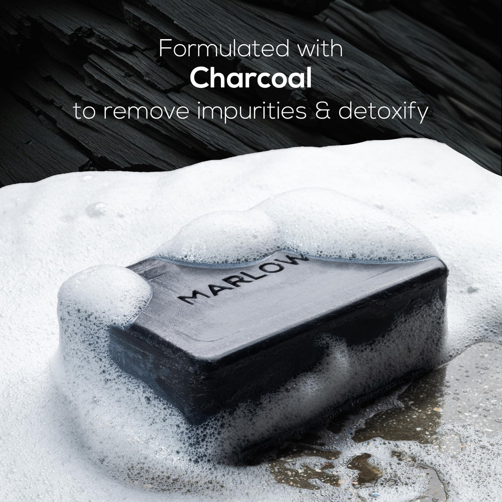 MARLOWE No. 106 charcoal soap with woodsy scent ideal for refreshing showers.