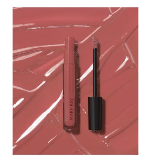 Mary Kay Unlimited Lip Gloss Unique Mauve applicator shows smooth application and long-lasting shine.