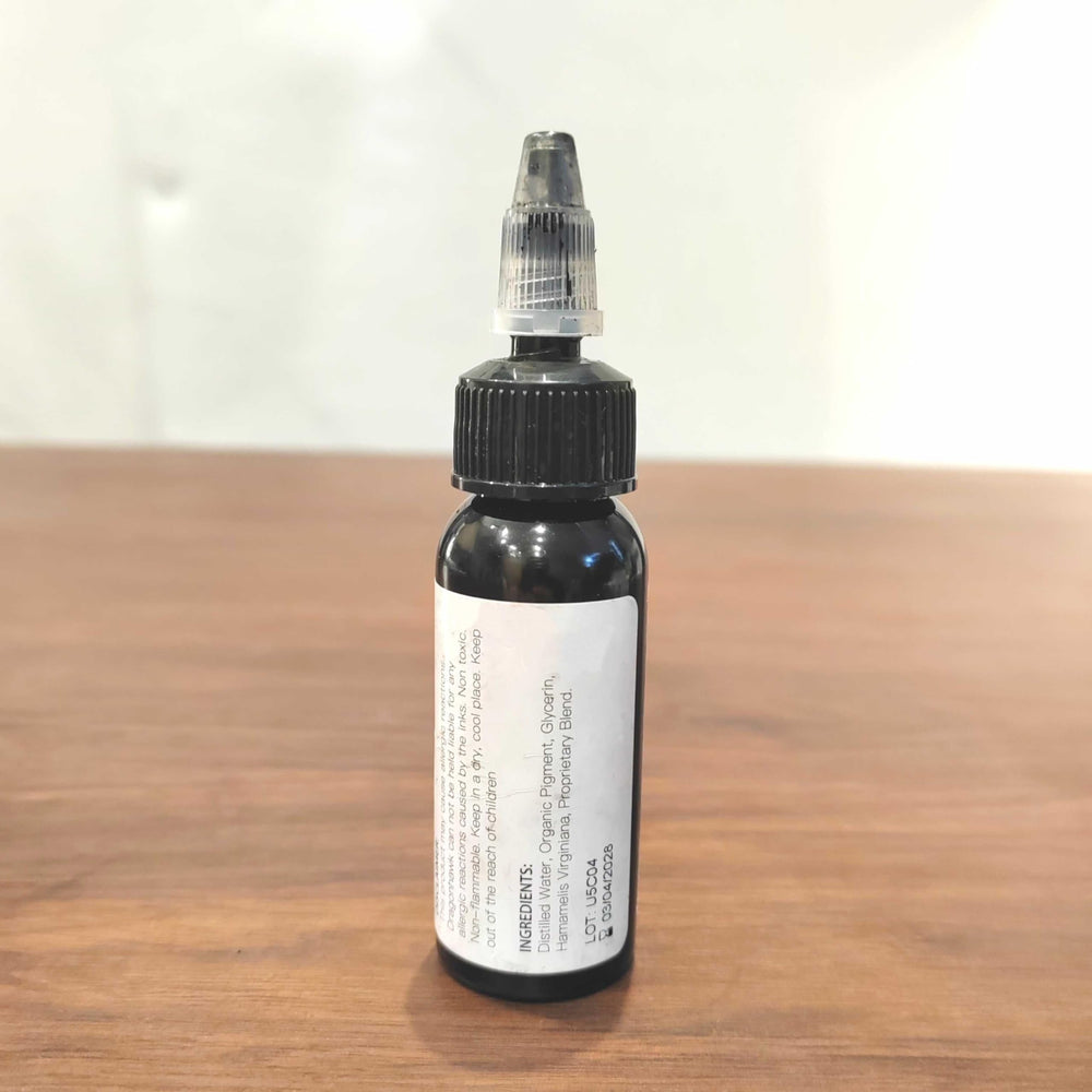 MAST TATTOO durable black pigment stays vibrant on skin.