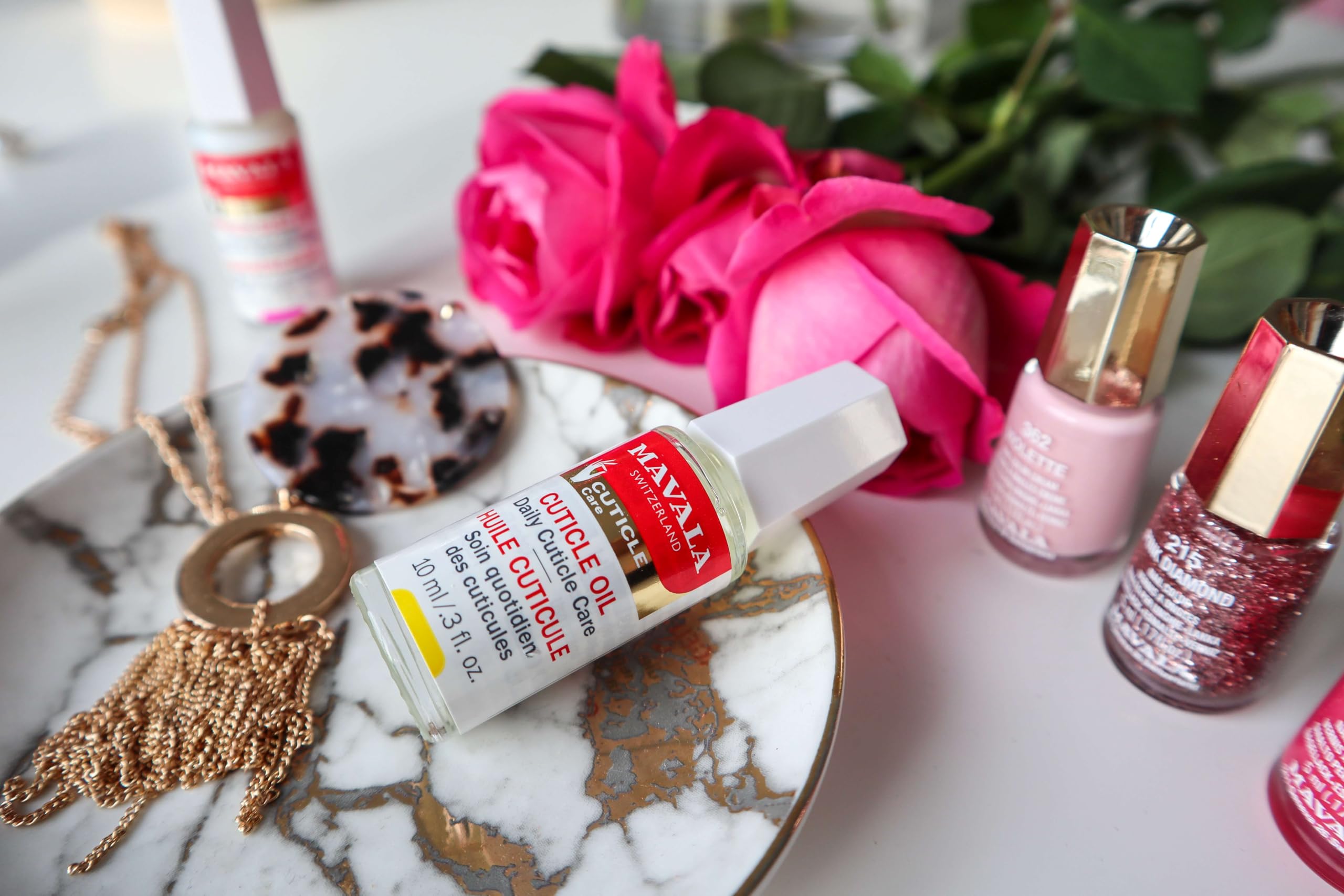 Mavala Cuticle Oil provides hydration and luxury care.