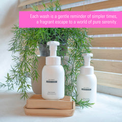 MAY MEDIC Baby Powder Hand Soap bottle on vanity with clean aroma.