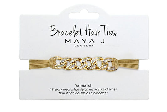 Maya J bracelet elastic hair tie featuring a beige-yellow heart crystal for everyday chic.