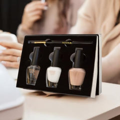 MAYA packaged set display shows complete at-home manicure contents.