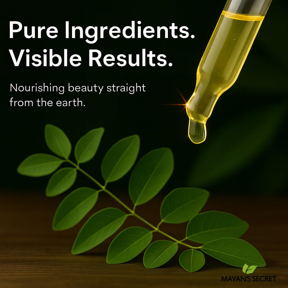 Mayan's Secret Moringa Energy Oil dropper dispensing oil.