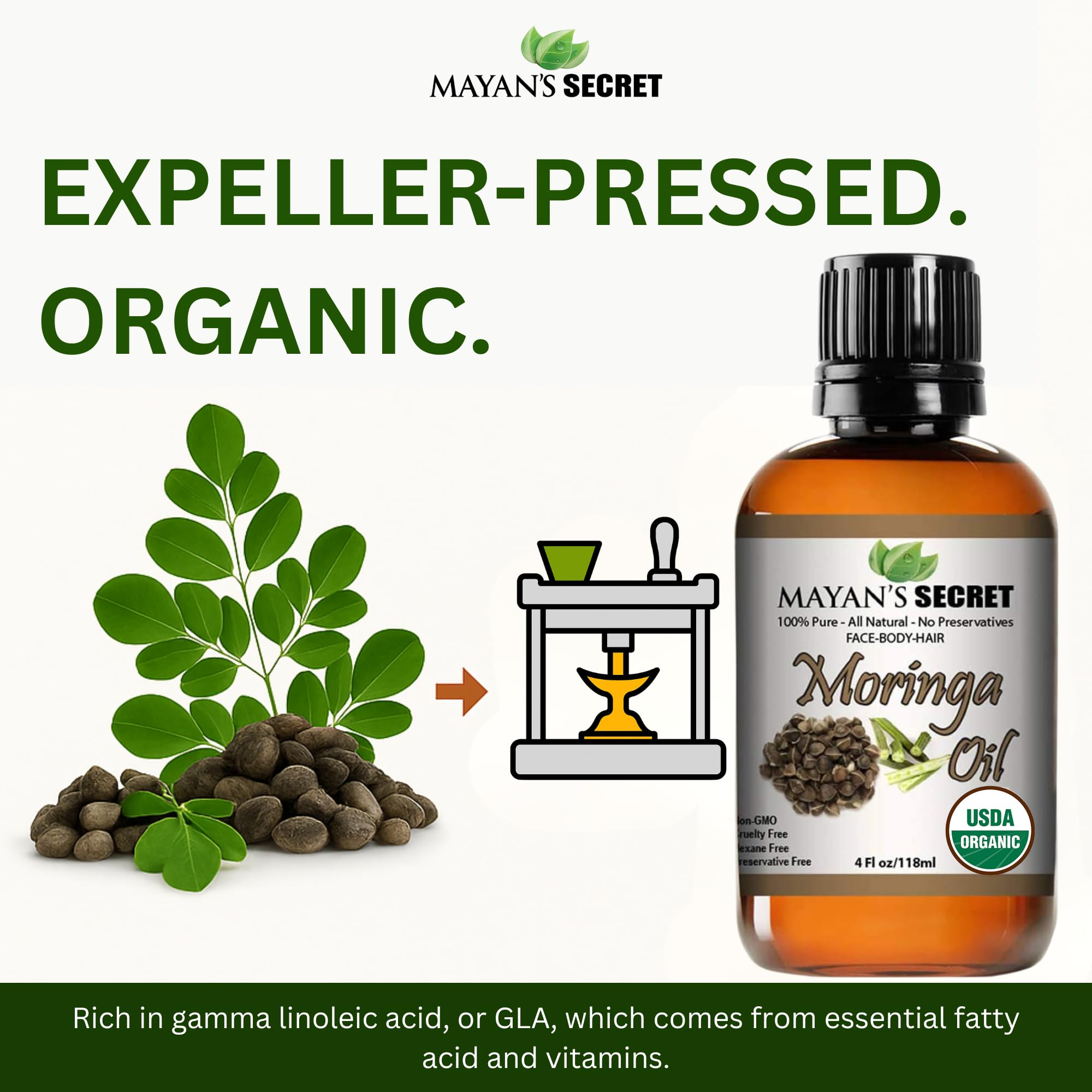 Mayan's Secret Moringa Energy Oil hair application on scalp.