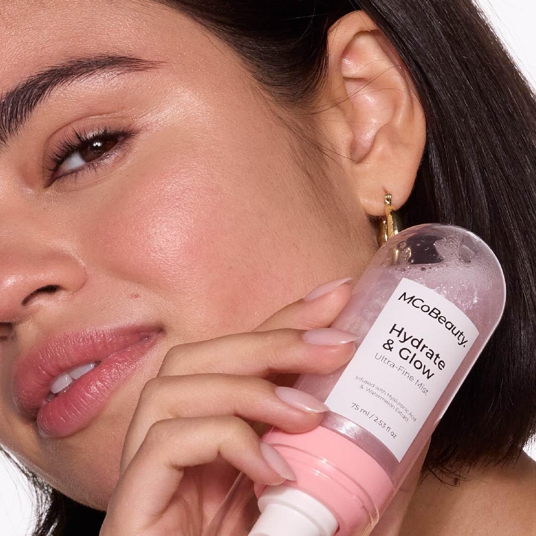 MCoBeauty Shimmer mist on skin delivering a subtle radiance.