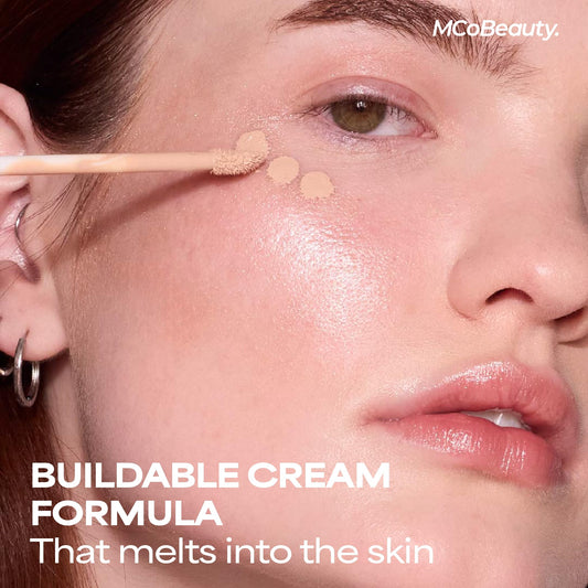 MCoBeauty Concealer swatches on skin display creamy texture for buildable coverage.