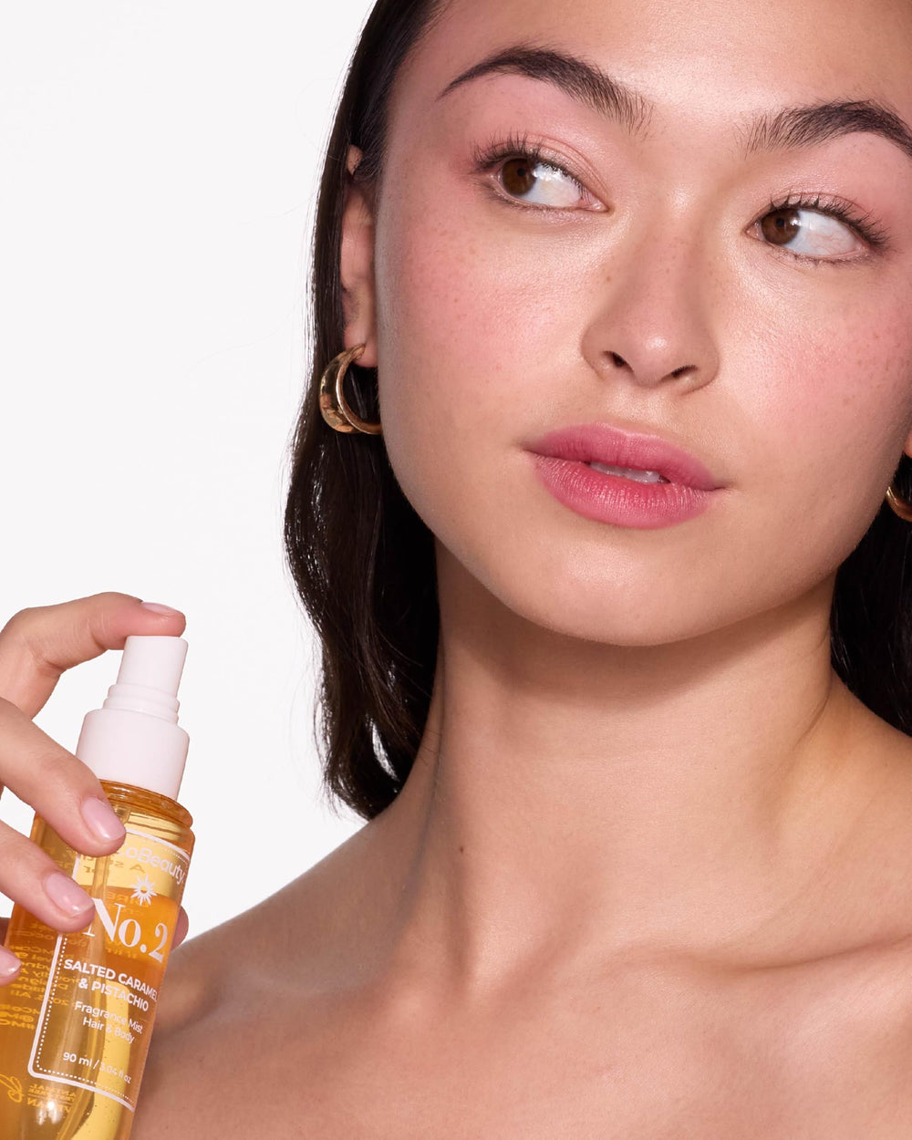 MCoBeauty Fragrance Mist No.2 pistachio-vanilla notes on silky mist texture.
