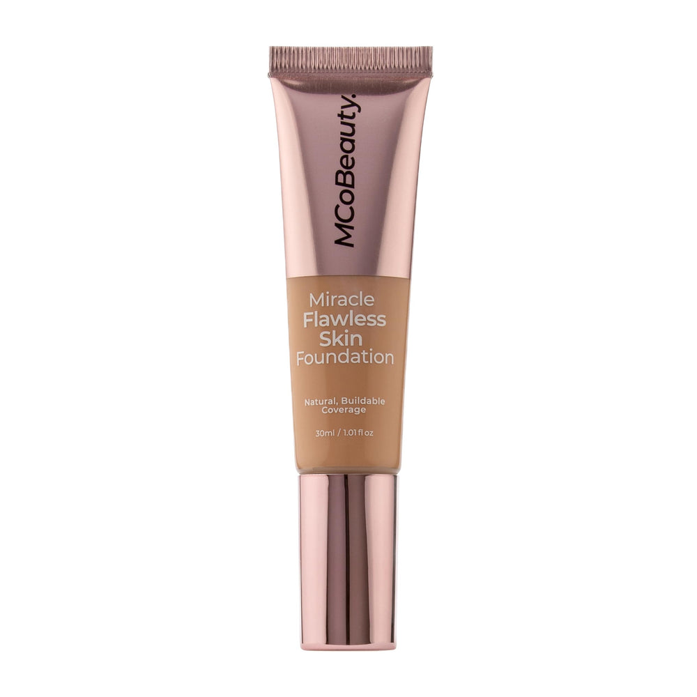 Foundation texture swatch on hand showing buildable medium coverage and radiant glow.