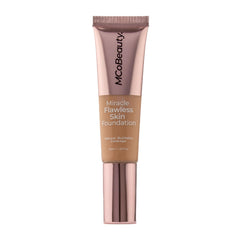 Foundation texture swatch on hand showing buildable medium coverage and radiant glow.