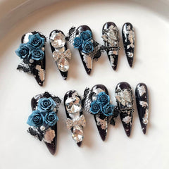 Meemooron 10-piece stiletto nails with black base and blue flowers for instant glamour