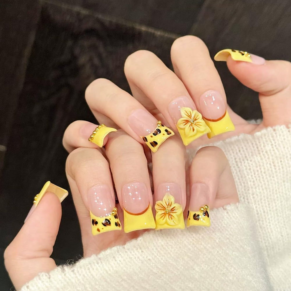 Close-up of 3D cherry blossoms on Meemooron nails for elegant detail.