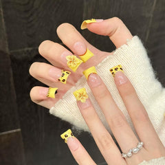 Meemooron Duck yellow French nails with leopard print add bold style to any outfit.