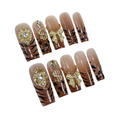 Meemooron handmade press-on nails featuring a gold crown accent for a regal touch.