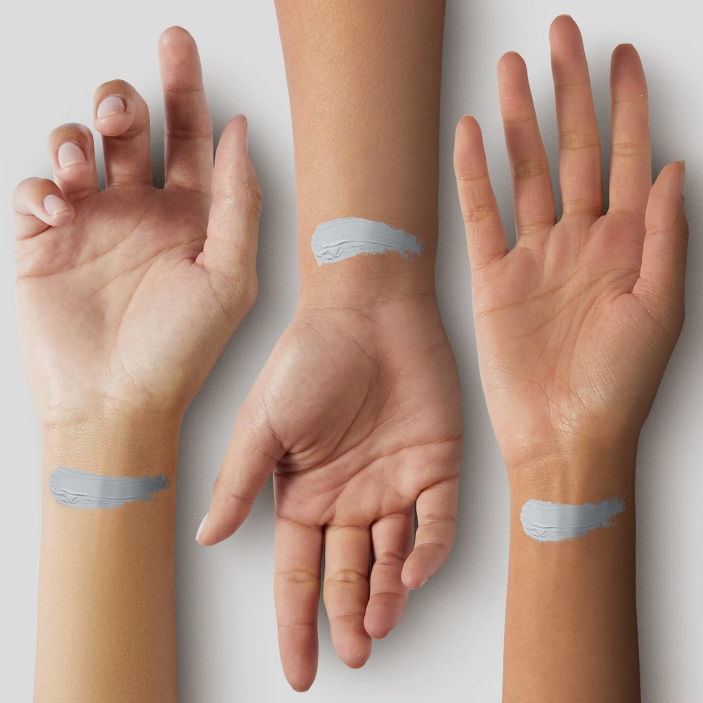 Close-up texture of Mehron CreamBlend Stick silver for smooth blending.