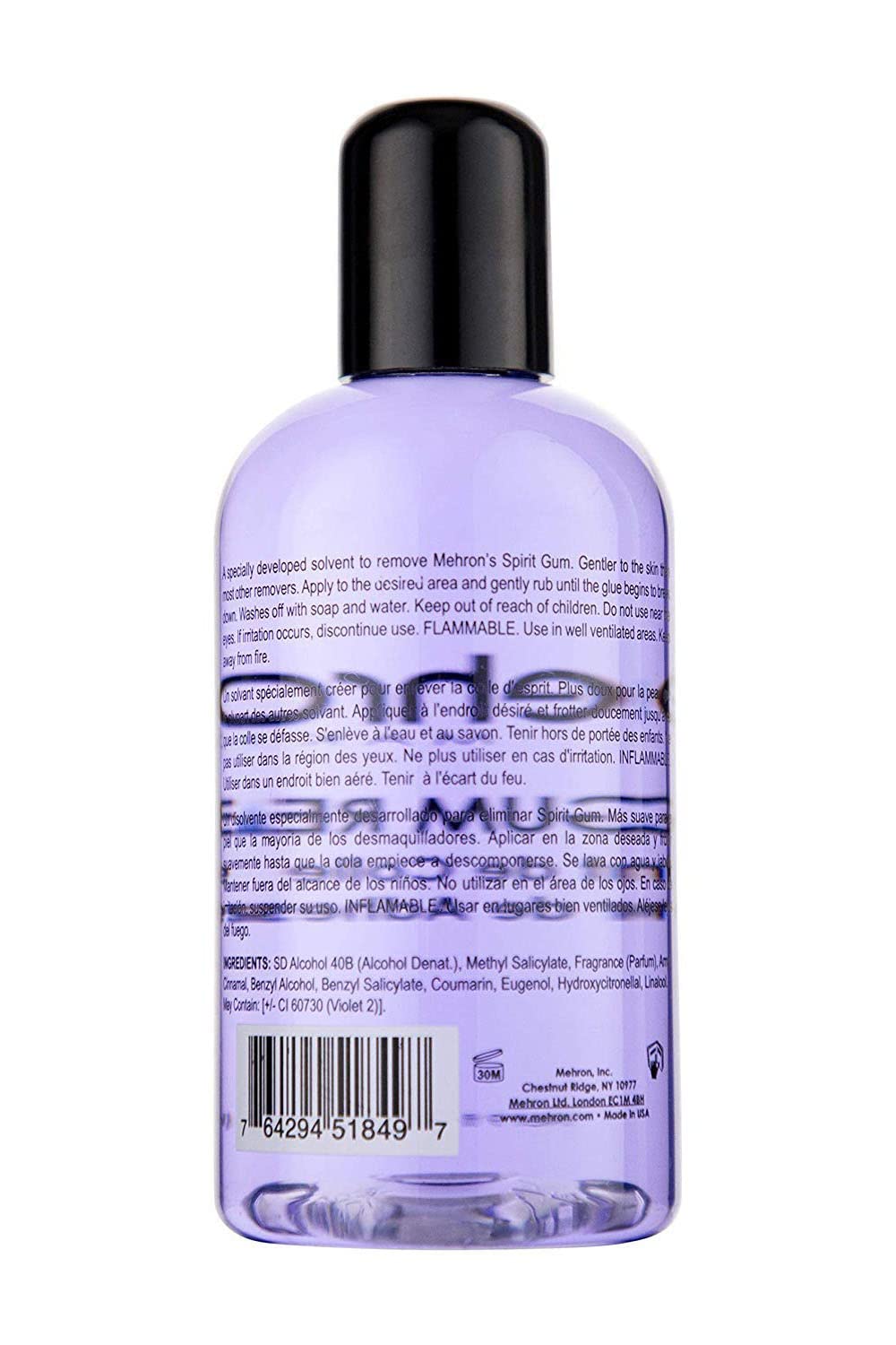 Pouring Mehron Spirit Gum Remover from bottle to dissolve adhesive