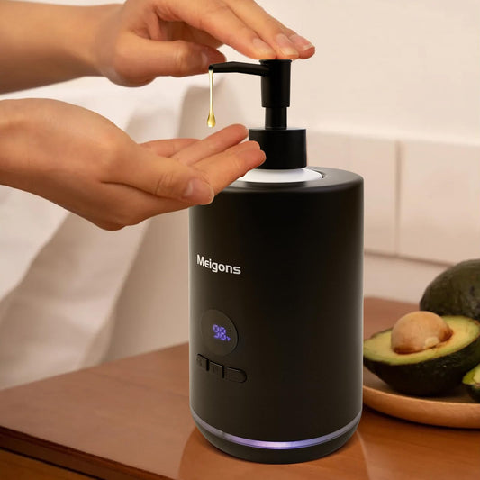 Meigons oil warmer with black dispenser front view showing dual bottles ready for massage sessions.