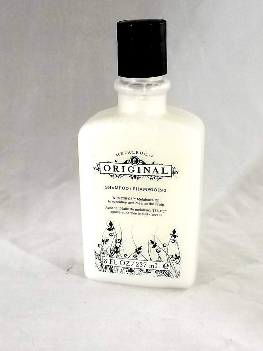 Melaleuca Original Shampoo bottle front showing invigorating herbal scent for daily scalp care.