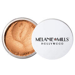 Melanie Mills Hollywood Gleam Radiant Dust adds golden body glow to shoulders and décolletage.