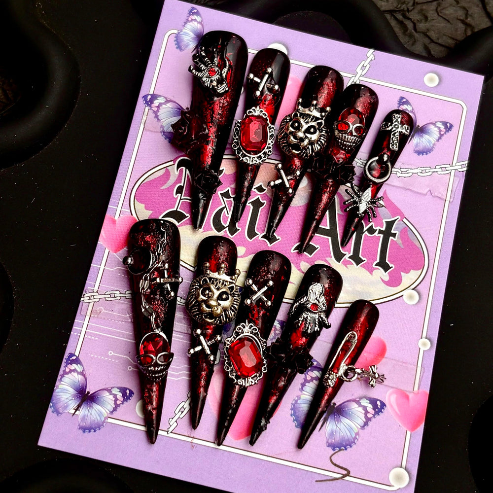 MellowBells Lize L nails show black floral baroque with chain accents for a bold party look