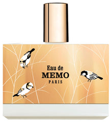 Memo Paris Eau de Memo bottle on a sleek surface, a luxury gift idea.