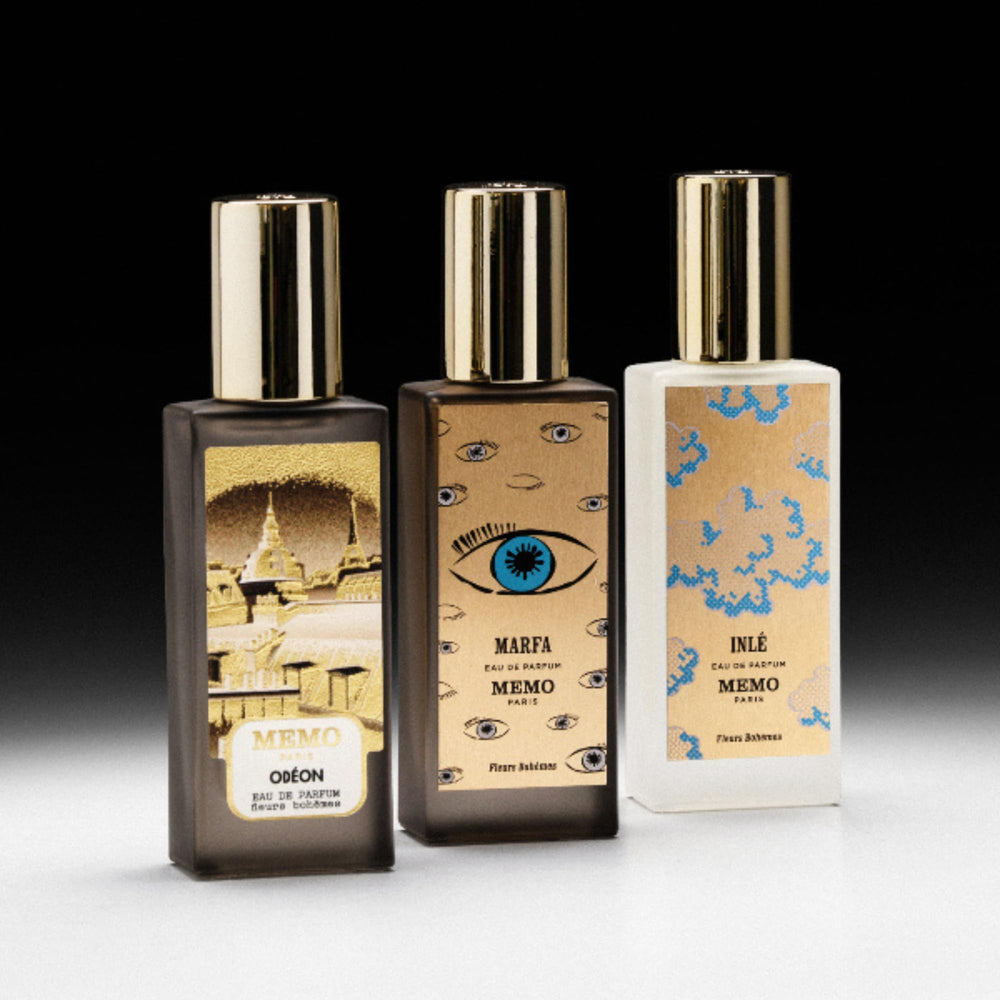 Memo Paris Marfa on a reflective surface evokes elegant evening fragrance ritual.