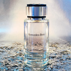 Mercedes-Benz For Men engraved logo on bottle showing luxury symbolism.