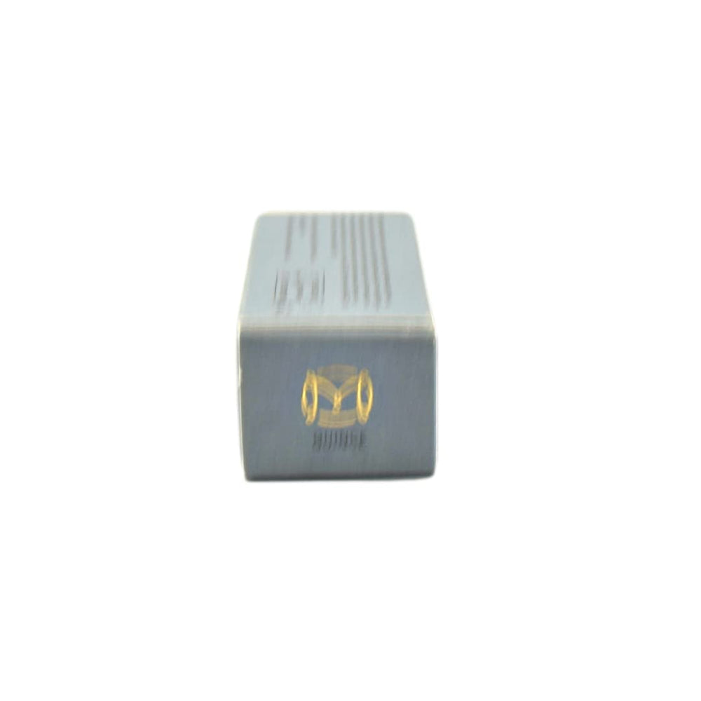 MERIT Bronze Balm Quince on jawline showcases sculpted definition with ease.