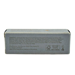 MERIT Bronze Balm Quince swirl on skin reveals gentle warmth.