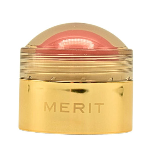 Merit Flush Balm Lusitano Soft Peach bottle shows creamy texture for quick glow.
