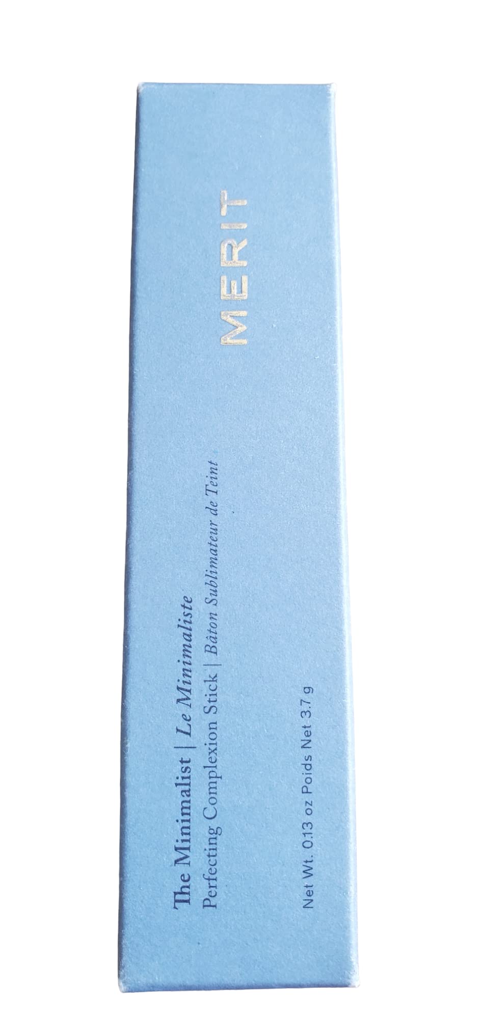 Merit Minimalist Foundation Stick in Umber, packaging close-up with vegan cruelty-free badge.