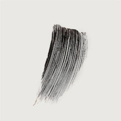 Close-up of tubing formula creating smooth lash film.
