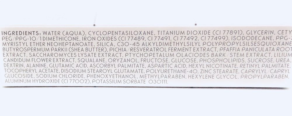 Merle Norman Dual Action Concealer Light packaging close-up showing sleek design and portability