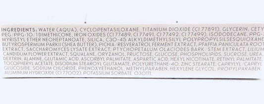Merle Norman Dual Action Concealer Light packaging close-up showing sleek design and portability