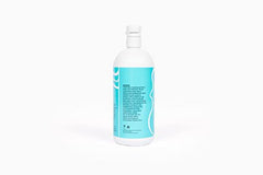 Mermaid Extension Care Shampoo 32oz bottle in lifestyle setting