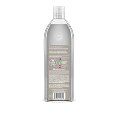Refill bottle being poured to fill an existing Method bottle