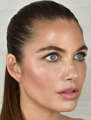 Silky whipped texture of Creme Fresh Tint Ginger Lily ready to blend on cheeks.