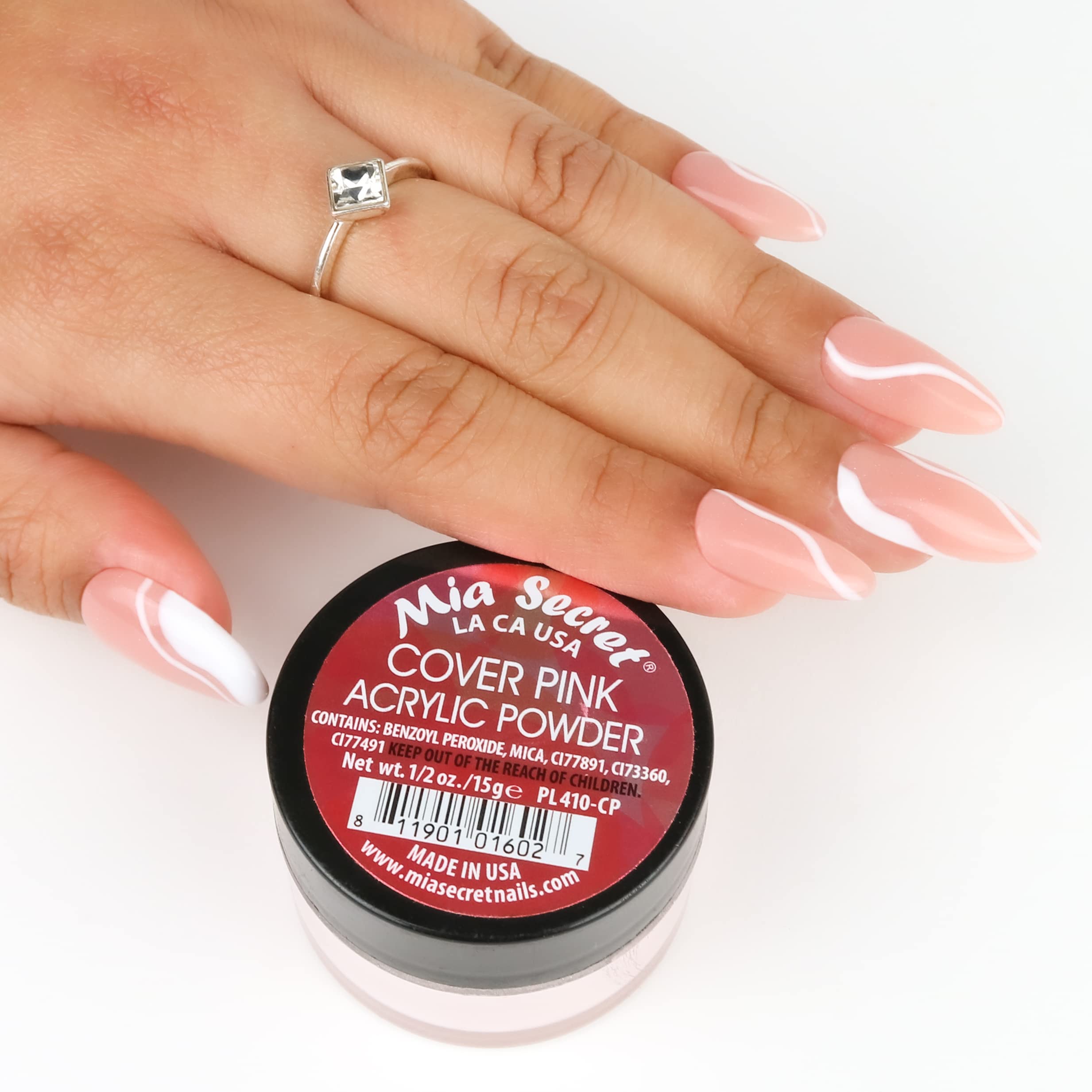 Closeup of Mia Secret Nails COVER PINK powder shows creamy texture for easy blending.