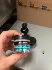 Mia Secret pink acrylic powder bottle for vibrant nail art tones.