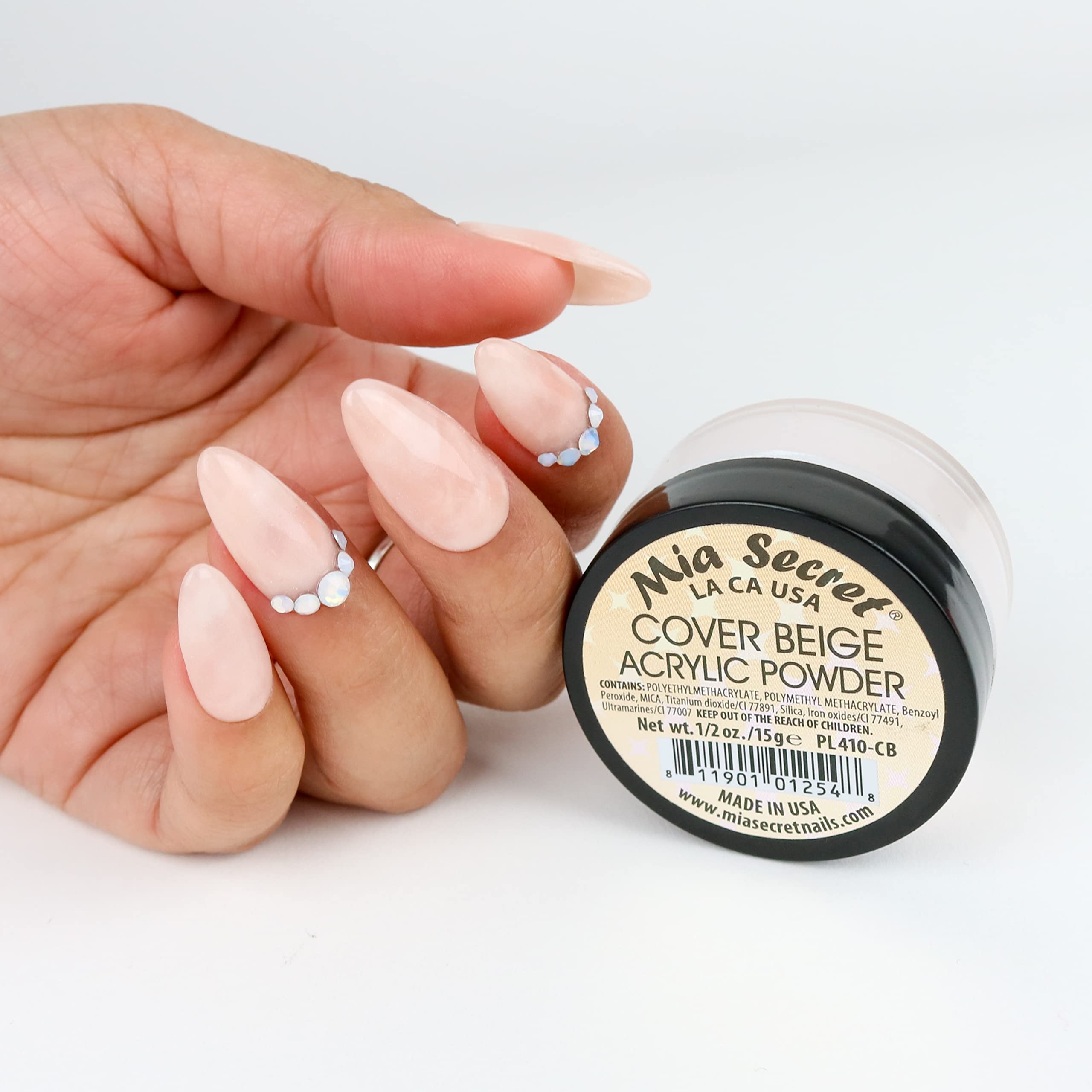 Mia Secret self-leveling acrylic powder close-up showing creamy texture and even application