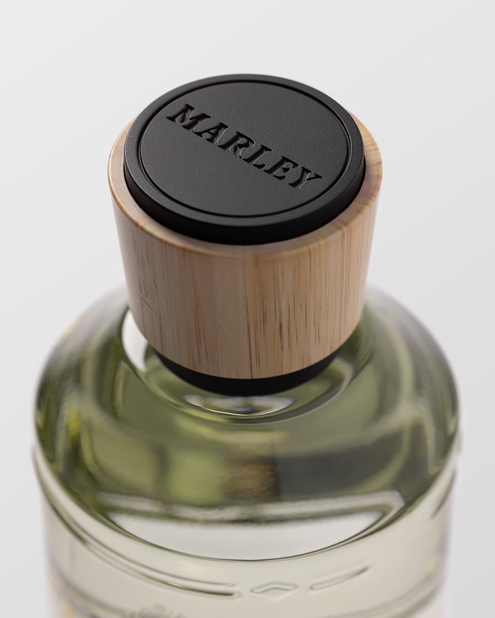 Michael Malul Marley Place of Peace bottle angled shot, emphasizes elegant fragrance presence.