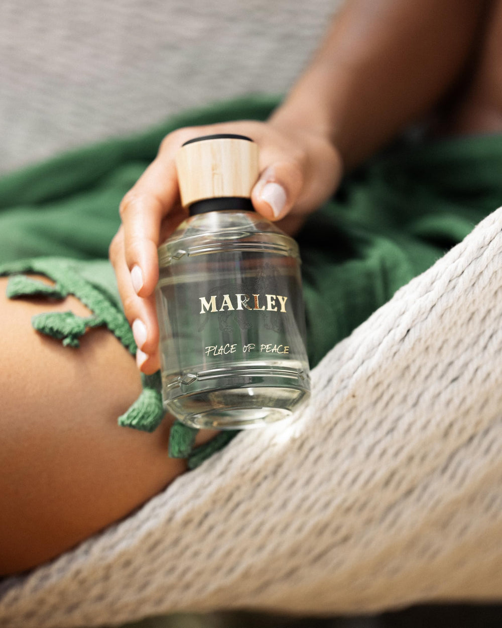 Michael Malul Marley Place of Peace logo detail, reinforces luxury branding.